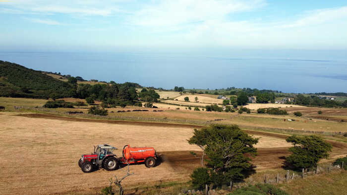 tractor on a farm tractor on a farm