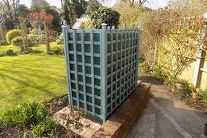 A bunded oil tank installed in Hampshire with lattice surround