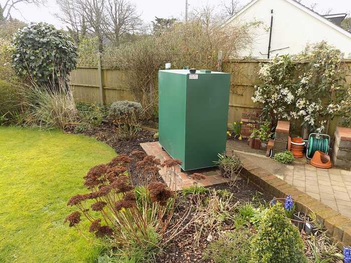 steel oil tank on brick base