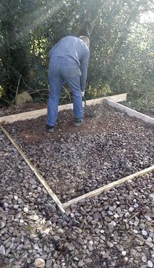 Levelling the fuel tank base area with gravel