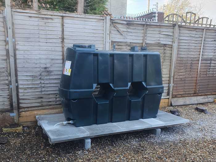 oil tank on slab base on gravel